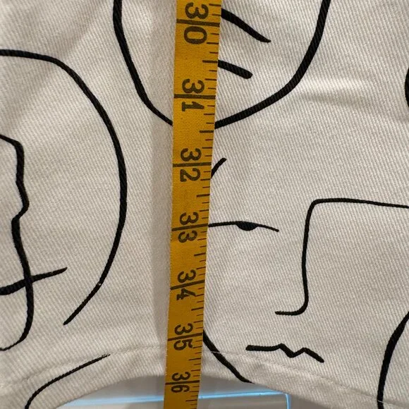 Shekou "Little Things" white denim jeans with a black abstract face print - Picture 6 of 8